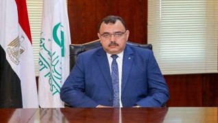 علوان" يكافئ العاملين بالبريد المصري